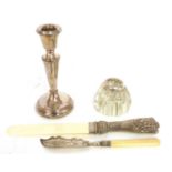 A silver bladed butter knife, Birmingham 1879, and a further silver mounted inkwell and a silver