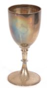 George V goblet of usual plain form, beaded spreading circular foot, knopped stem (repaired),