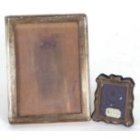 Mixed Lot: A George V plain rectangular silver mounted photograph frame with oak easel back,