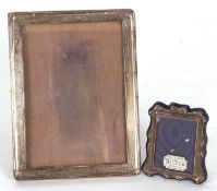 Mixed Lot: A George V plain rectangular silver mounted photograph frame with oak easel back,