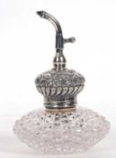 Edward VII hobnail cut glass based scent atomiser with an embossed silver mounted top, lacking