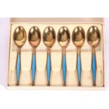 Cased set of six Norwegian silver gilt and blue enamelled coffee spoons by David Andersen