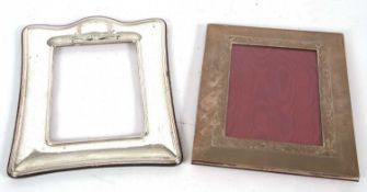 Mixed Lot: A 20th Century white metal framed photograph frame with limited engraved decoration,