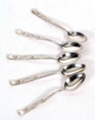 Five 'Tiffany' sterling teaspoons in the Iris pattern, 80 gms
