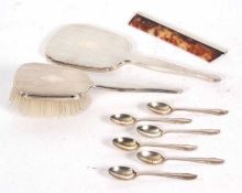 Mixed Lot: A three piece silver backed dressing table set comprising mirror, brush and comb, all
