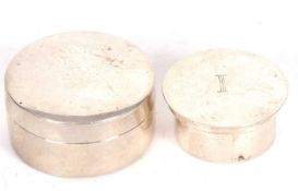 Small circular gilt lined wafer box with screw down lid, Birmingham 1971 and a further slightly