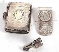 George V silver vester of typical form, engine turned decoration one side with a vacant cartouche,