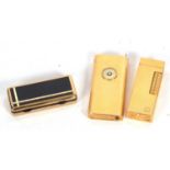 Mixed Lot: A 1980's Dunhill gold plated rollagas cigarette lighter with engine turned rectangular