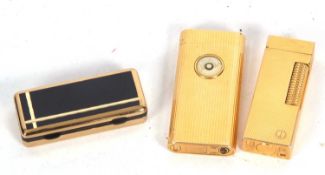 Mixed Lot: A 1980's Dunhill gold plated rollagas cigarette lighter with engine turned rectangular