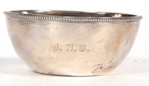 George V silver bowl of plain round form having a beaded rim, Birmingham 1931, makers mark for I S