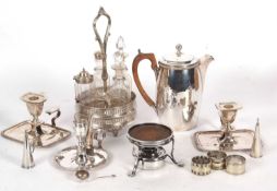 Box of silver plated wares to include a pair of antique chamber sticks, hot water jug, spirit