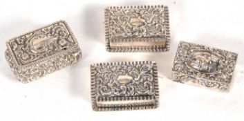 Group of 4925 marked small rectangular boxes each with hinged lids and embossed decoration, 118.6