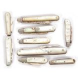 Seven various silver bladed mother of pearl handle fruit knives, a steel bladed example together