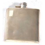 Art Deco silver hip flask of slight curved form, engine turned decoration and one side with a