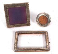 Three silver photograph frames to include a rectangular design, hallmarked Birmingham 1920, 15.5 x