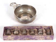 Sterling marked spot hammered porringer typical form with flat pierced handle, the base stamped