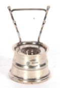 Edwardian silver ink well and pen stand in the form of a well, the body with a reeded band applied