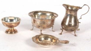 Mixed Lot: Matching silver cream jug and sugar bowl with applied floral cast rims on four hoof feet,