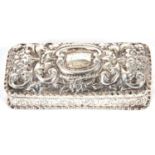 Late Victorian silver trinket box of rectangular form, the hinged lid with a slight dome shape,