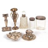 Mixed Lot: George V single embossed candle stick, Birmingham 1924, 12cm tall, a silver ashtray