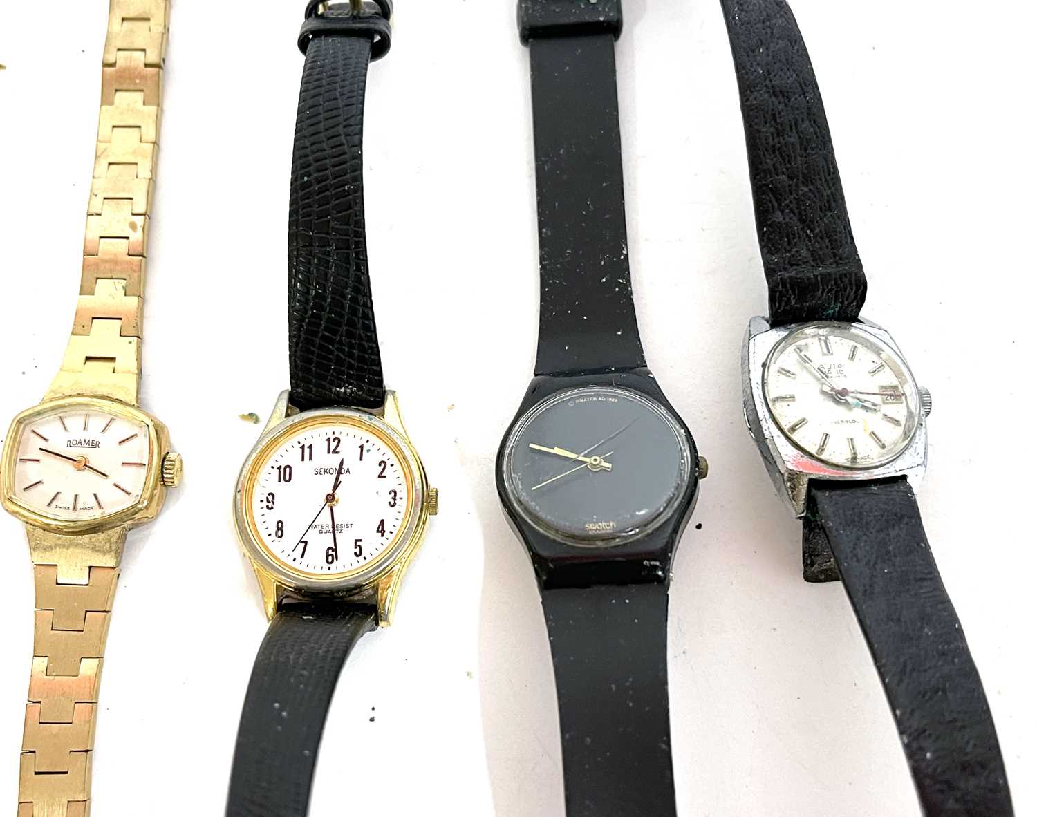Mixed lot of four ladies wristwatches, these include makes such as Sekonda, Roma, Avia and Swatch ( - Image 4 of 4