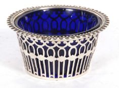 Hallmarked silver sugar bowl of circular form with pierced geometric design with a crimped rim, blue