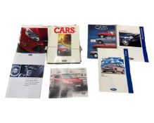Approximately fifteen Ford sale brochures and manuals