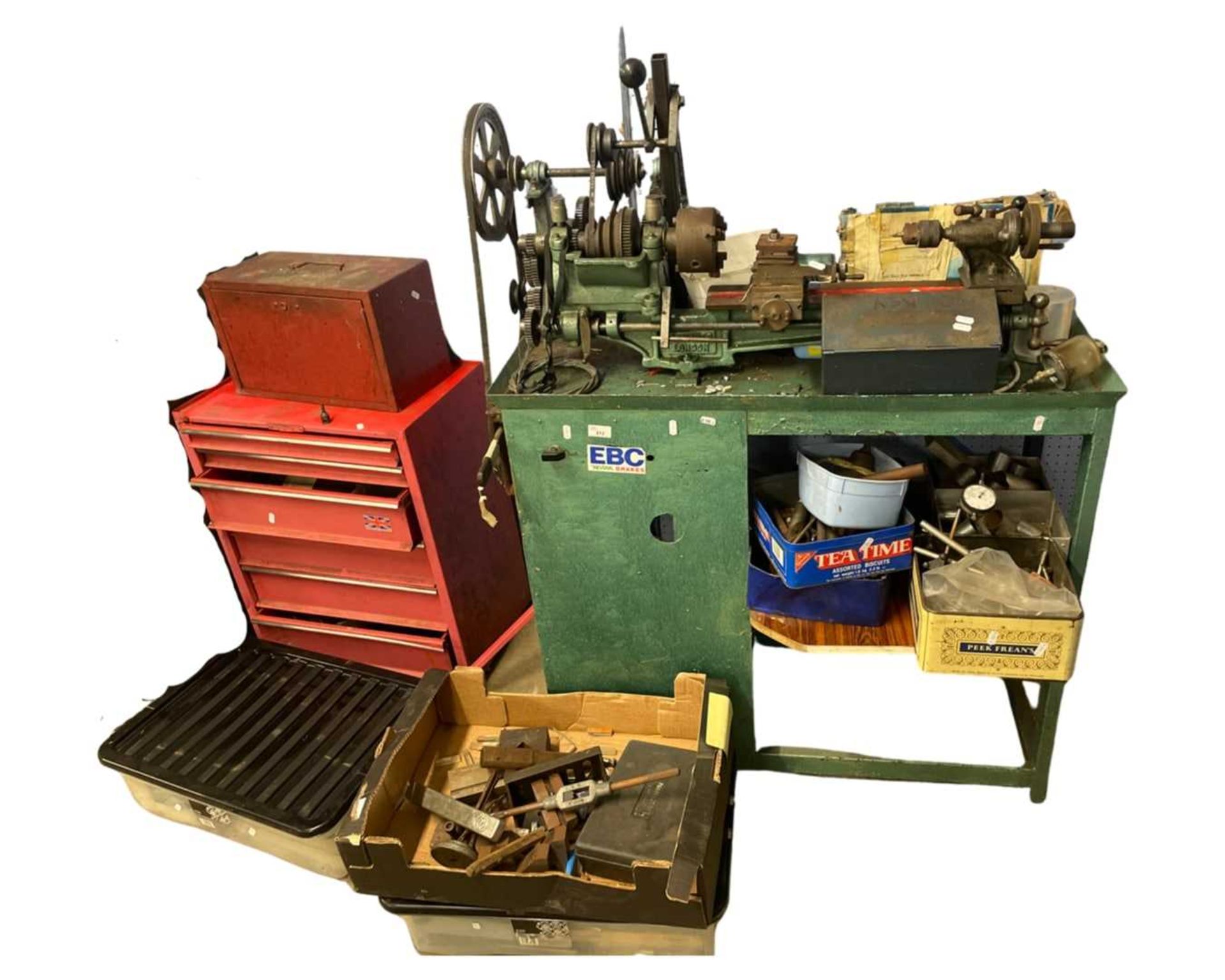 Vintage belt driven lathe by Gamages of London together with a workshop toolbox including all