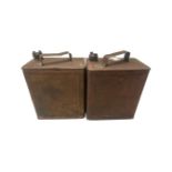 Two vintage two cannon petrol cans with brass tops
