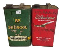 Two one gallon oil cans, BP and Silkoline