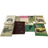 Box containing 11 Ford manuals including Escort, Cortina, Anglia etc