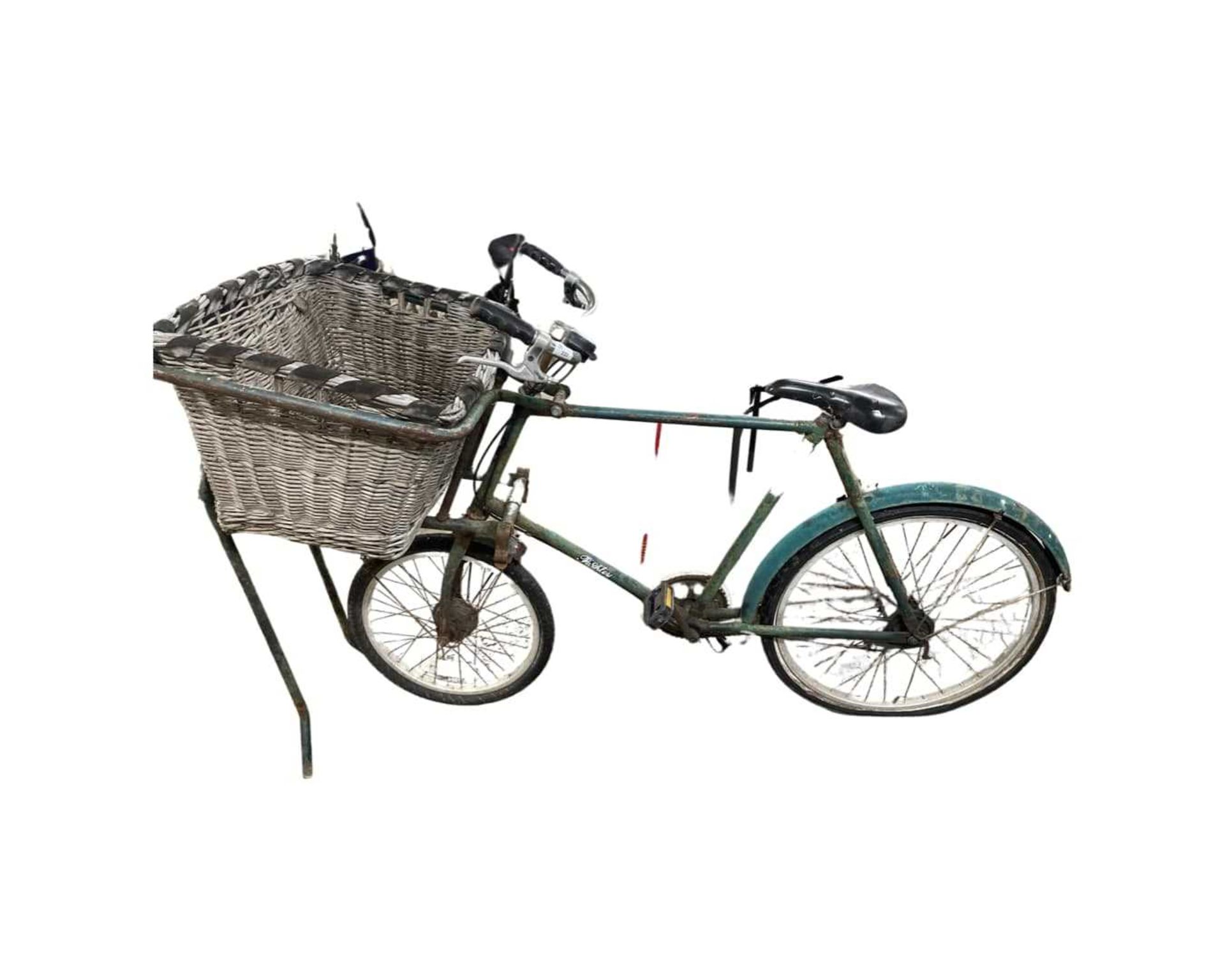 Vintage Pashley Bakers bike with basket and stand