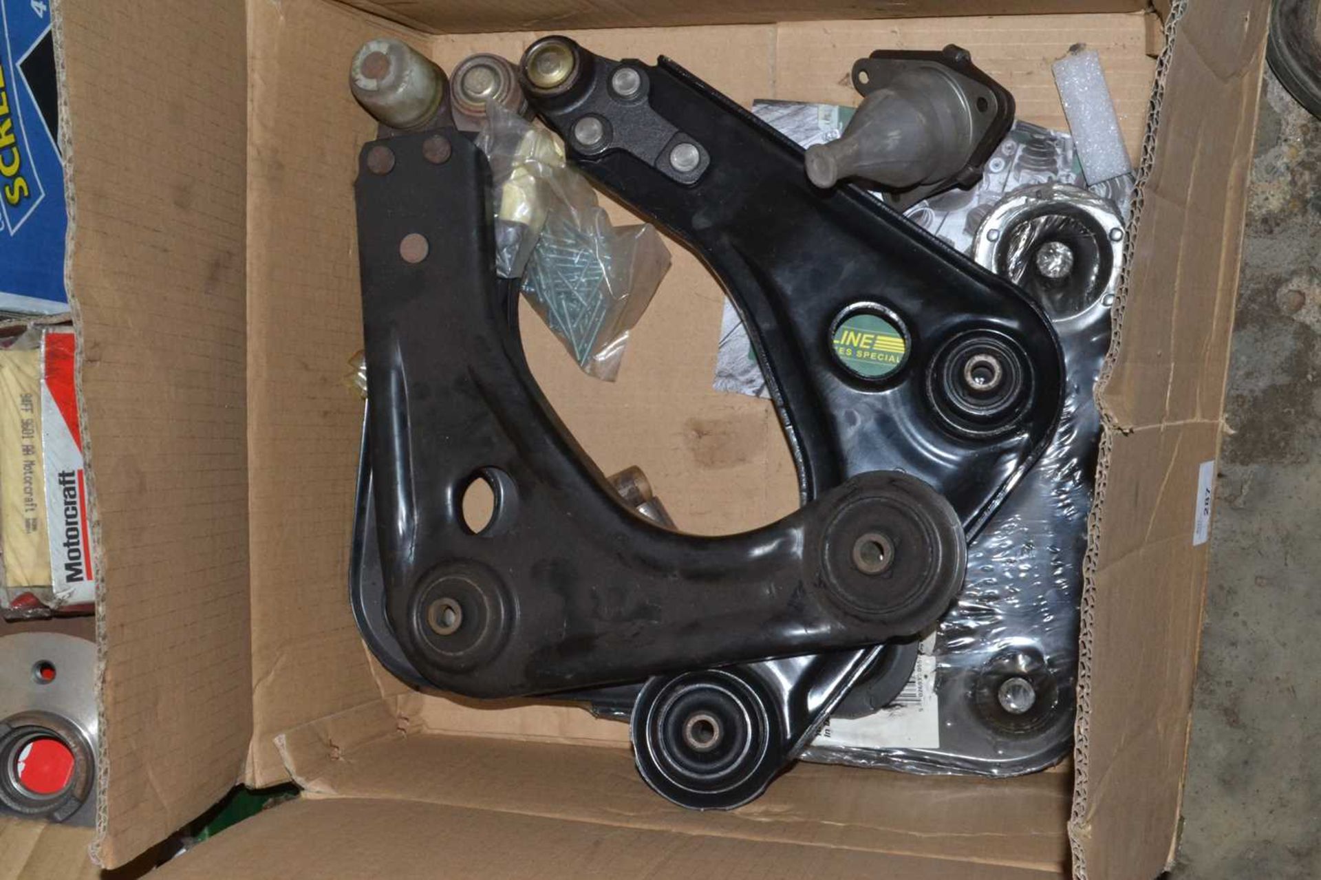 Box containing four genuine Ford left hand and right hand arm assy