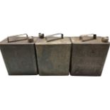 Three two gallon petrol cans, one Shell Motor Spirit, two unbranded