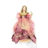A 1987 Franklin Heirloom Dolls porcelain doll on stand, modelled as a princess in pink gown with