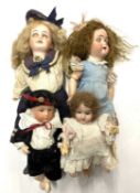 A mixed lot of various bisque head dolls, to include: - A sailor / Navy doll marked 1902 8/0 to nape