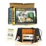 A boxed Binatone MK10 Colour TV Game by Magnavox, with instructions.