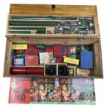 A large wooden box of mixed vintage Meccano, instruction manuals, motors etc