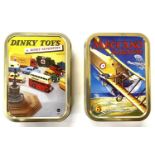 A pair of collectible tobacco tins, depicting vintage advertising for Dinky Toys and Meccano