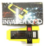 A 1980s boxed Galaxy Invader 1000 handheld console, by Computer Games Limited.