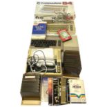 A boxed Commodore 64 computer and accessories to include: - Commodore 64 keyboard with cover -