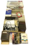A boxed Commodore 64 computer and accessories to include: - Commodore 64 keyboard with cover -