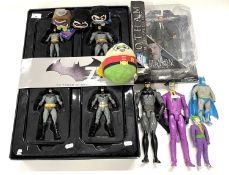 A mixed lot of DC Batman merchandise to include: - A boxed collectors set of 4 Batman figures,