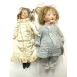 A pair of Heubach Koppelsdorf bisque head dolls, to include: - Open-mouthed, marked 275.76/o to nape