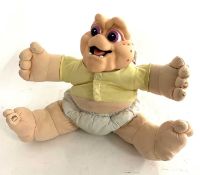 A 1990s pull-action talking Baby Sinclair from Disney/Jim Henson's Dinosaurs