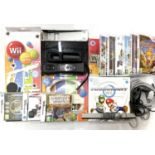 A Nintendo Wii Console in black and a quantity of accessories and games, to include: - Boxed Exspect