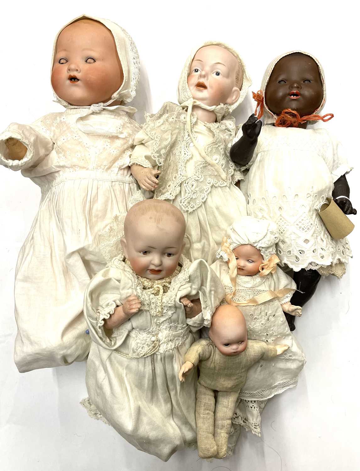 A mixed lot of various bisque head baby dolls, to include: - An Armand Marseille, marked 351./3.K.