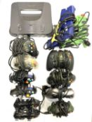A mixed lot of various wired gaming controllers and a Nintendo 64 console.Original Xbox, Xbox 360,