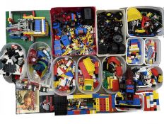 A large quantity of 1980s - 1990s Lego pieces and parts, to include Technic, Pirates, Police,