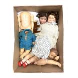 A mixed lot of dolls / doll parts to include: - A bisque dolls head, marked Armand Marseille Germany